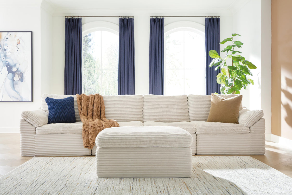 Mega Furniture - Ashley Furniture - Fannin Sectional - RAF 4-Piece Sectional with Ottoman / Ivory - PC84304S1