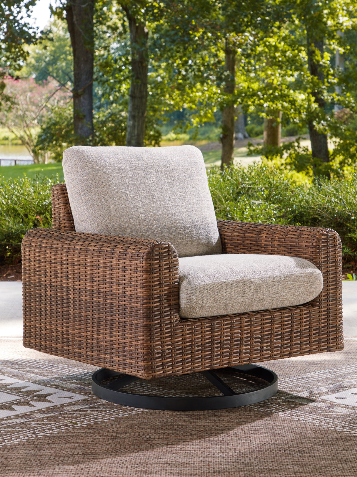Mega Furniture - Ashley Furniture - Dolan Creek Outdoor - Swivel Lounge w/ Cushion / Gray/Brown - PCP610-821