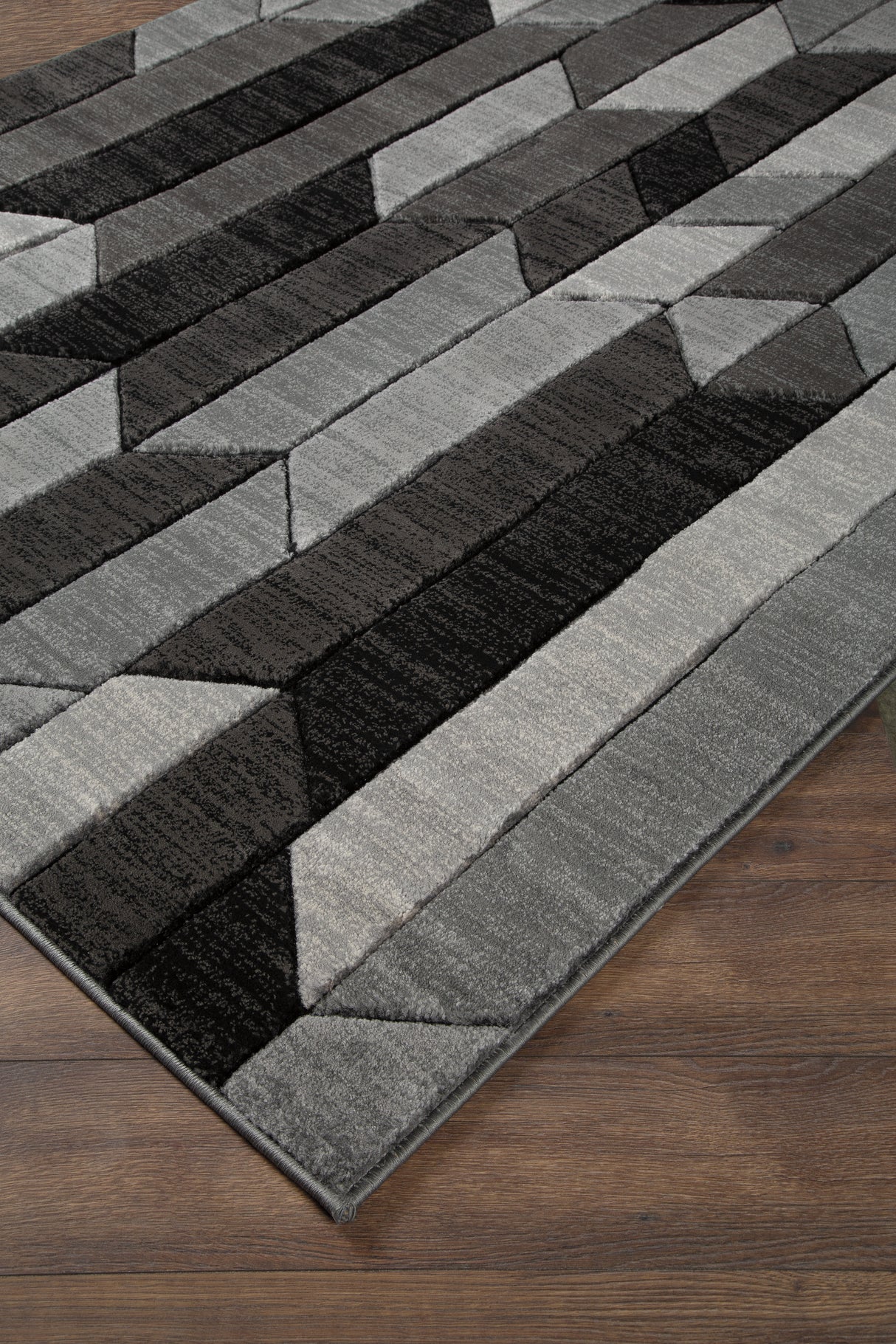 Mega Furniture - Ashley Furniture - Chayse Rug - 6'6" x 9'6" Rug / Black/Gray - R403461