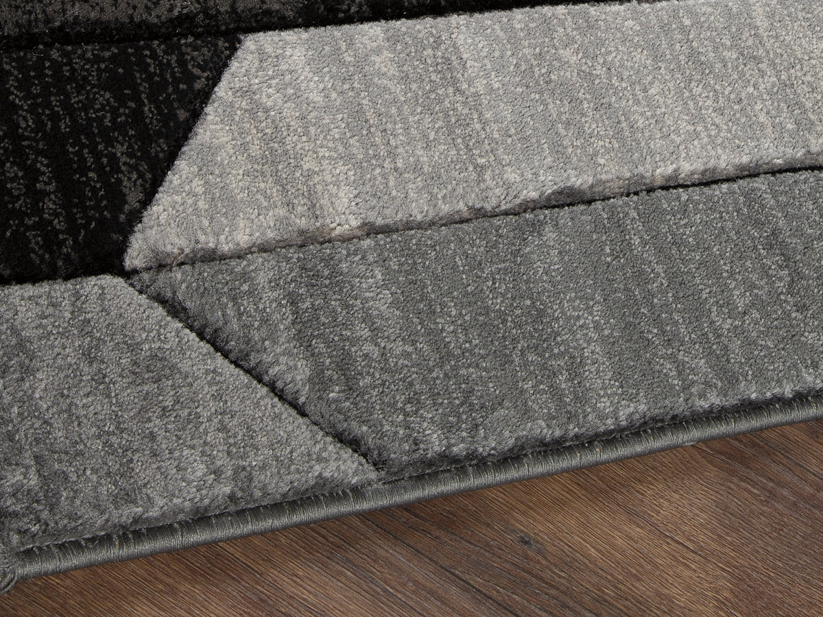 Mega Furniture - Ashley Furniture - Chayse Rug - 6'6" x 9'6" Rug / Black/Gray - R403461