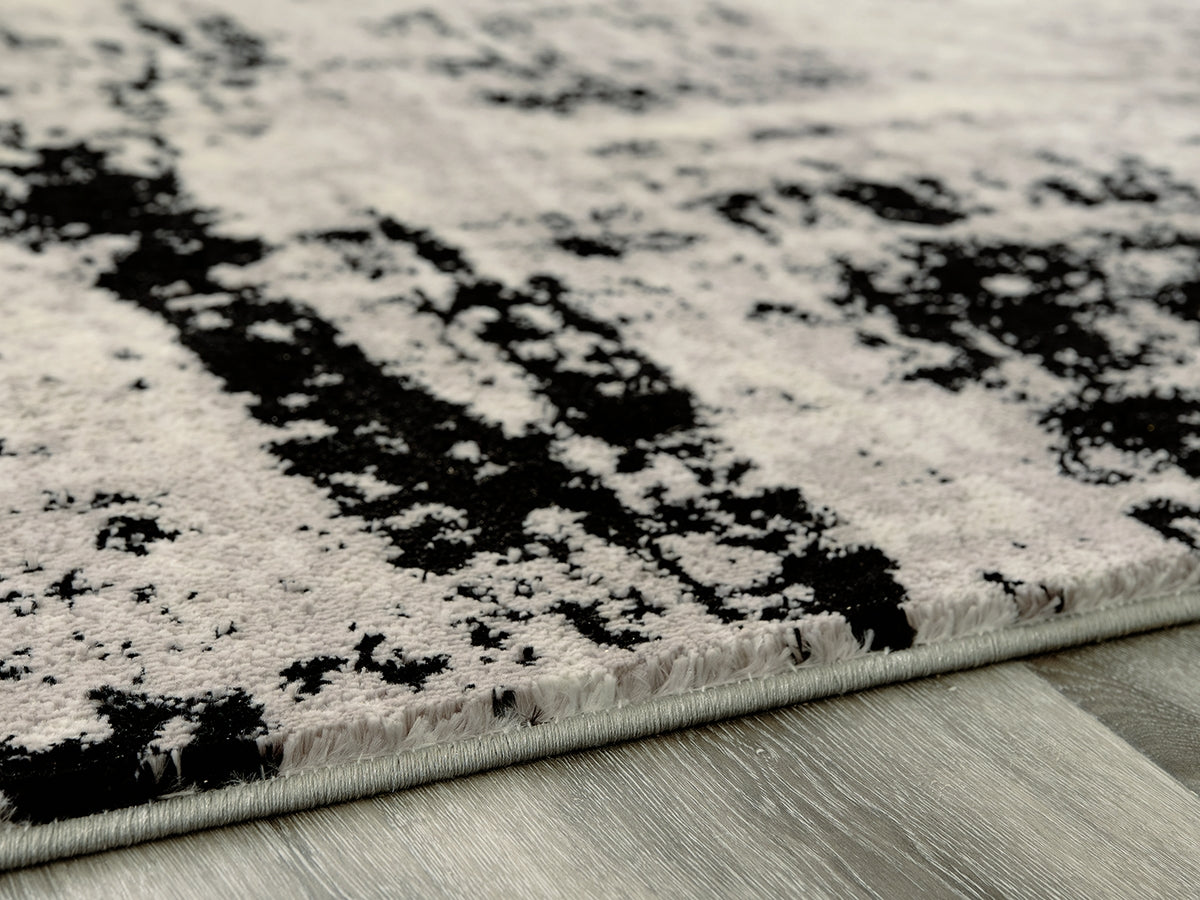 Mega Furniture - Ashley Furniture - Zekeman Rug - 5'3" x 7'7" Rug / Black/Cream/Gray - R404922