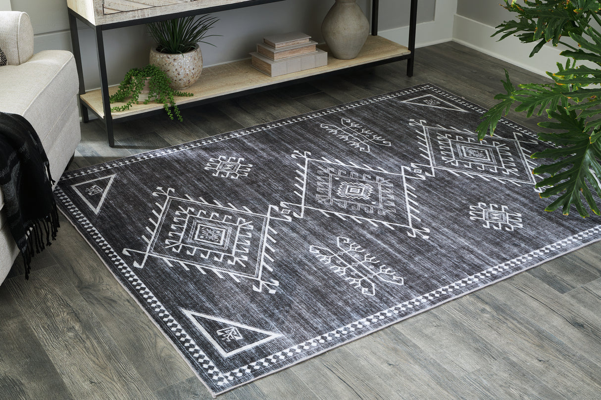 Mega Furniture - Ashley Furniture - Arloman Rug - 5' x 7' Washable Rug / Black/Cream/Gray - R405932