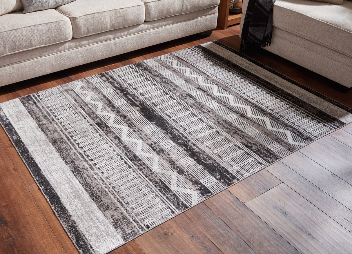 Mega Furniture - Ashley Furniture - Henchester Rug - 5' x 7' Washable Rug / Multi - R405992