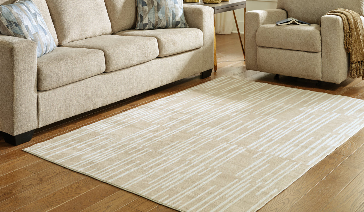 Mega Furniture - Ashley Furniture - Ardenville Rug - 5' x 7'1" Washable Rug / Tan/Cream - R406212