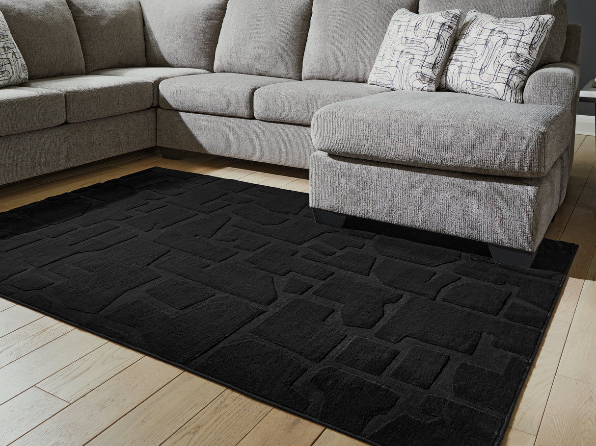 Mega Furniture - Ashley Furniture - Gibbswell Rug - Washable 5' x 7' Area Rug / Black - R407462