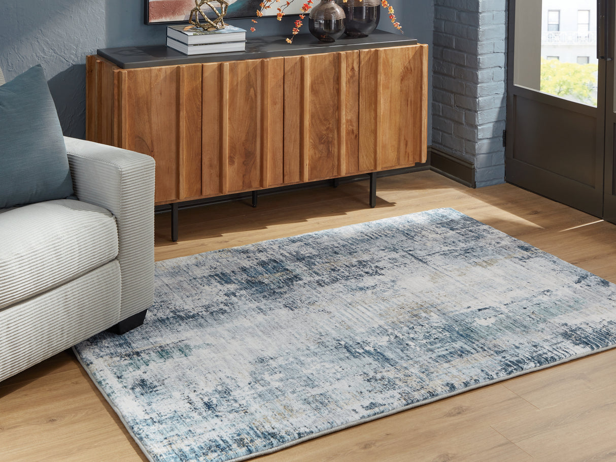 Mega Furniture - Ashley Furniture - Arlenmont Rug - 5' x 7' Area Rug / Blue/White/Brown - R407482