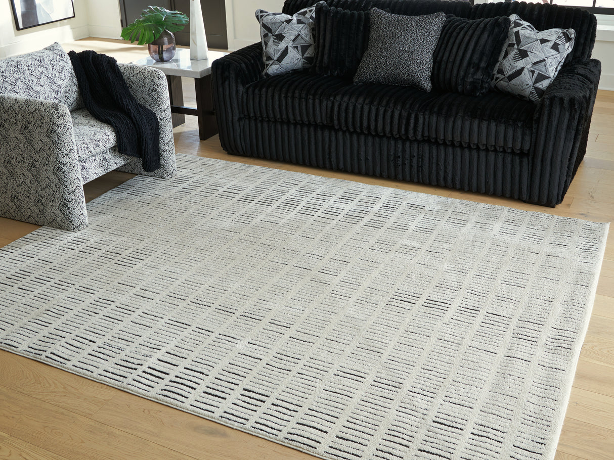 Mega Furniture - Ashley Furniture - Turinwith Rug - 7'10" x 9'10" Area Rug / Ivory/Black - R407551