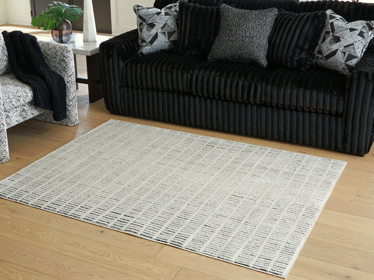 Mega Furniture - Ashley Furniture - Turinwith Rug - 5'3" x 7' Area Rug / Ivory/Black - R407552
