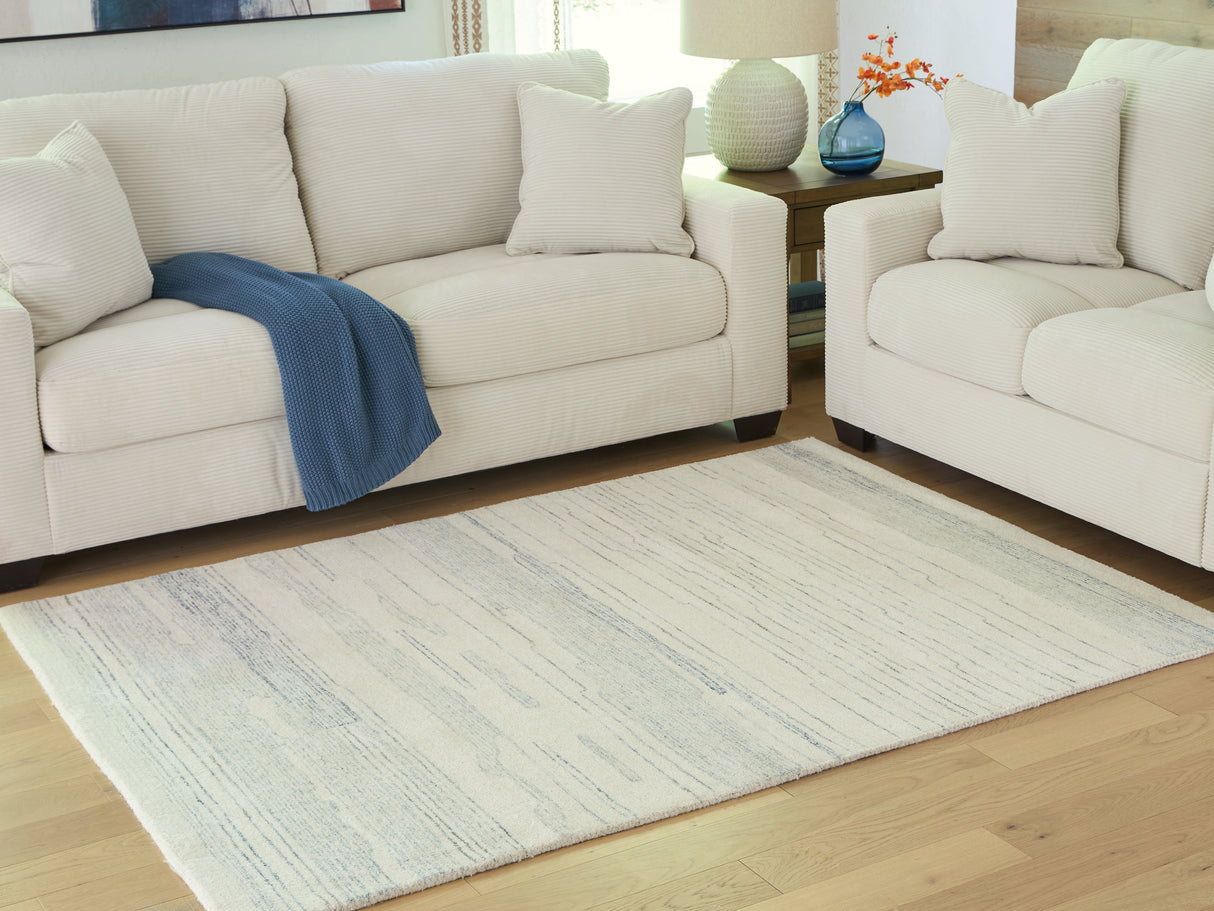 Mega Furniture - Ashley Furniture - Genemost Rug - 5' x 7' Area Rug / Ivory/Blue - R407842