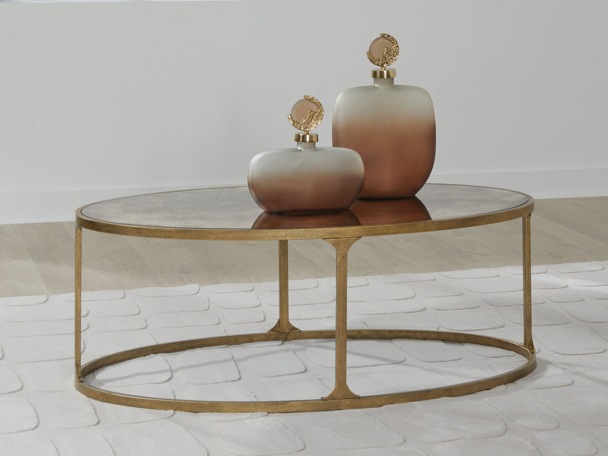Mega Furniture - Ashley Furniture - Korajane Coffee Table - Oval Cocktail Table / Antique Gold - T399-0