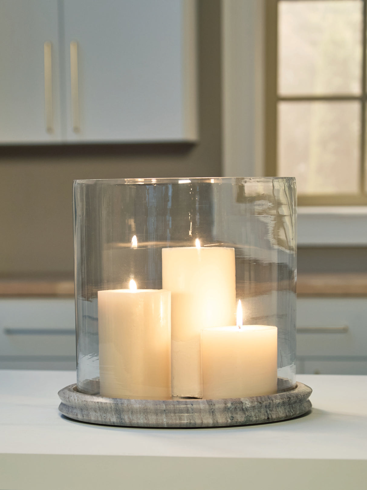 Mega Furniture - Ashley Furniture - Saskia Candle Holder - Candle Holder / Clear/Beige - A2000847
