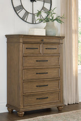 Mega Furniture - Ashley Furniture - Karallin Bedroom - Seven Drawer Chest / Medium Brown - PCB782-46