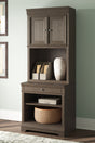 Mega Furniture - Ashley Furniture - Janismore Bookcase - Bookcase / Weathered Gray - H776H7