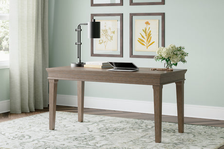 Mega Furniture - Ashley Furniture - Janismore Office Desk - Home Office Desk / Weathered Gray - H776-44