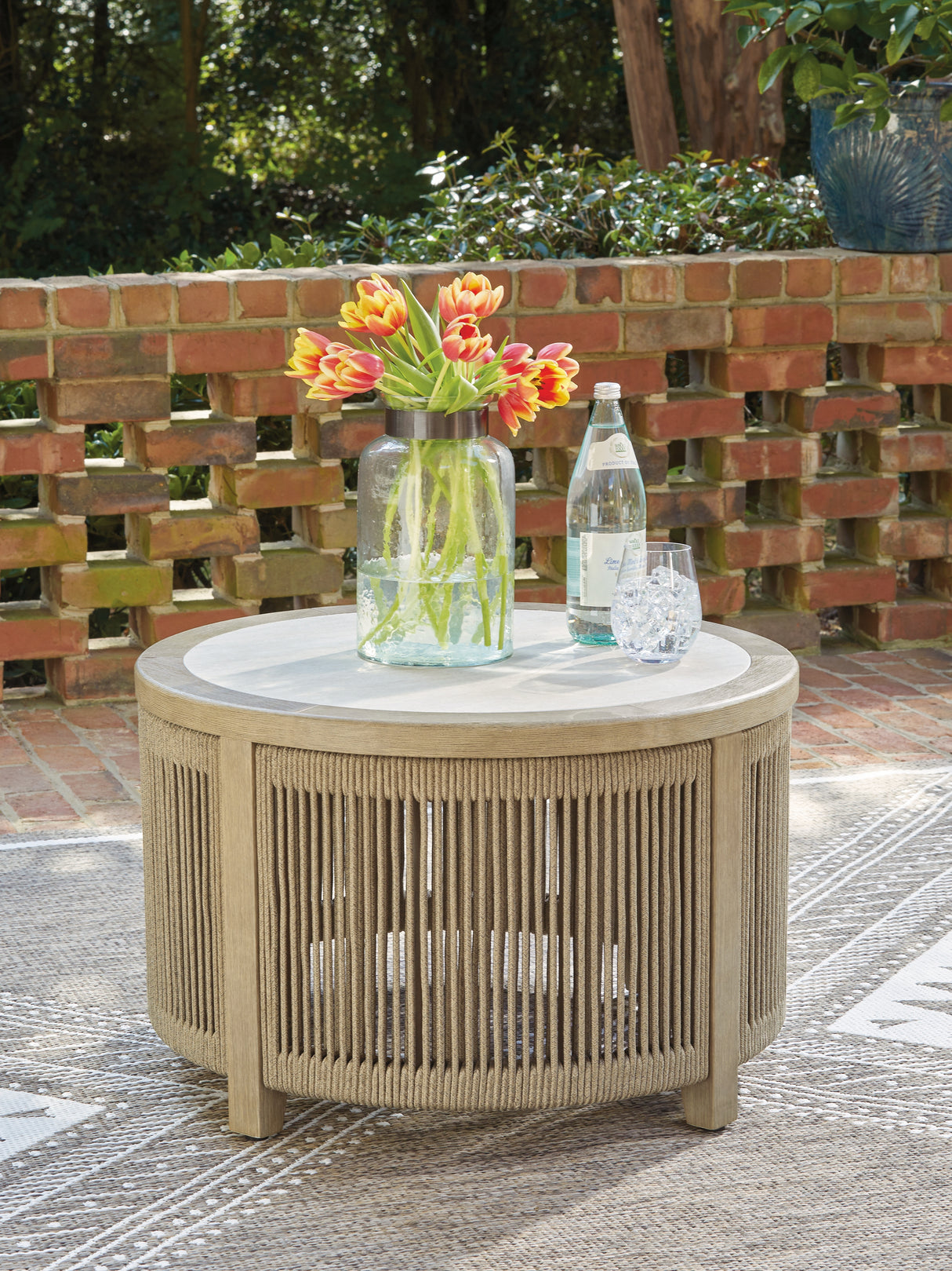 Mega Furniture - Ashley Furniture - Spooners Cove Outdoor - Round Cocktail Table / Beige - PCP469-708