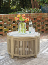 Mega Furniture - Ashley Furniture - Spooners Cove Outdoor - Round Cocktail Table / Beige - PCP469-708