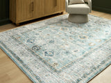 Mega Furniture - Ashley Furniture - Ladstoney Rug - 5' x 7' Area Rug / Teal/Beige/Ochre - R407502