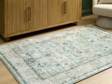 Mega Furniture - Ashley Furniture - Ladstoney Rug - 5' x 7' Area Rug / Teal/Beige/Ochre - R407502