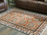 Mega Furniture - Ashley Furniture - Qaabiz Rug - 5' x 7' Area Rug / Sienna/Ivory/Black - R407522