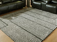 Mega Furniture - Ashley Furniture - Kurtmen Rug - 5' x 7' Area Rug / Black/Ivory - R407592