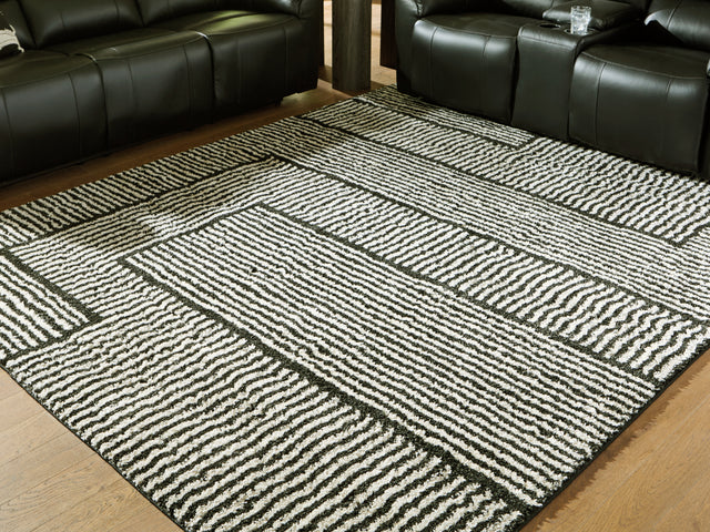 Mega Furniture - Ashley Furniture - Kurtmen Rug - 5' x 7' Area Rug / Black/Ivory - R407592