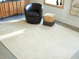 Mega Furniture - Ashley Furniture - Wolbert Rug - 5' x 7' Area Rug / Tan/Ivory - R407662